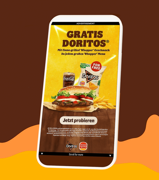 A mobile screen showing the Burger King and Doritos ad.